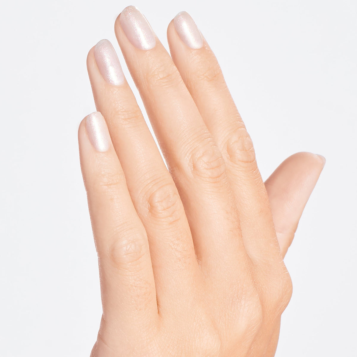 A manicure painted in OPI Throw Me a Kiss