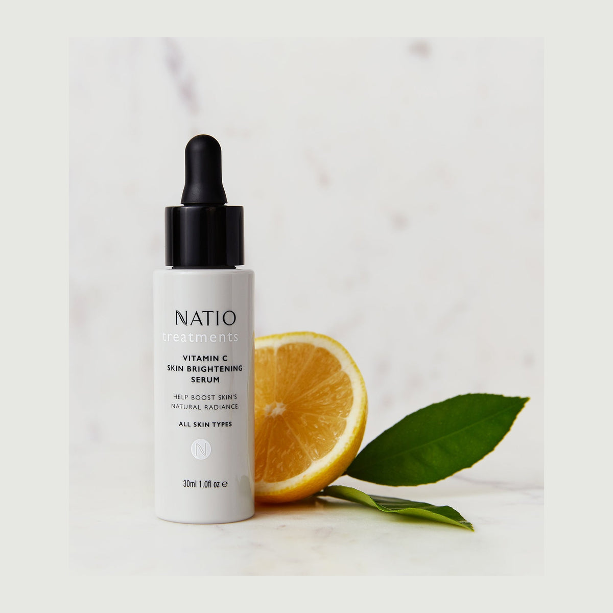 Natio Treatments Vitamin C Skin Brightening Serum 30ml styled in a set photograph