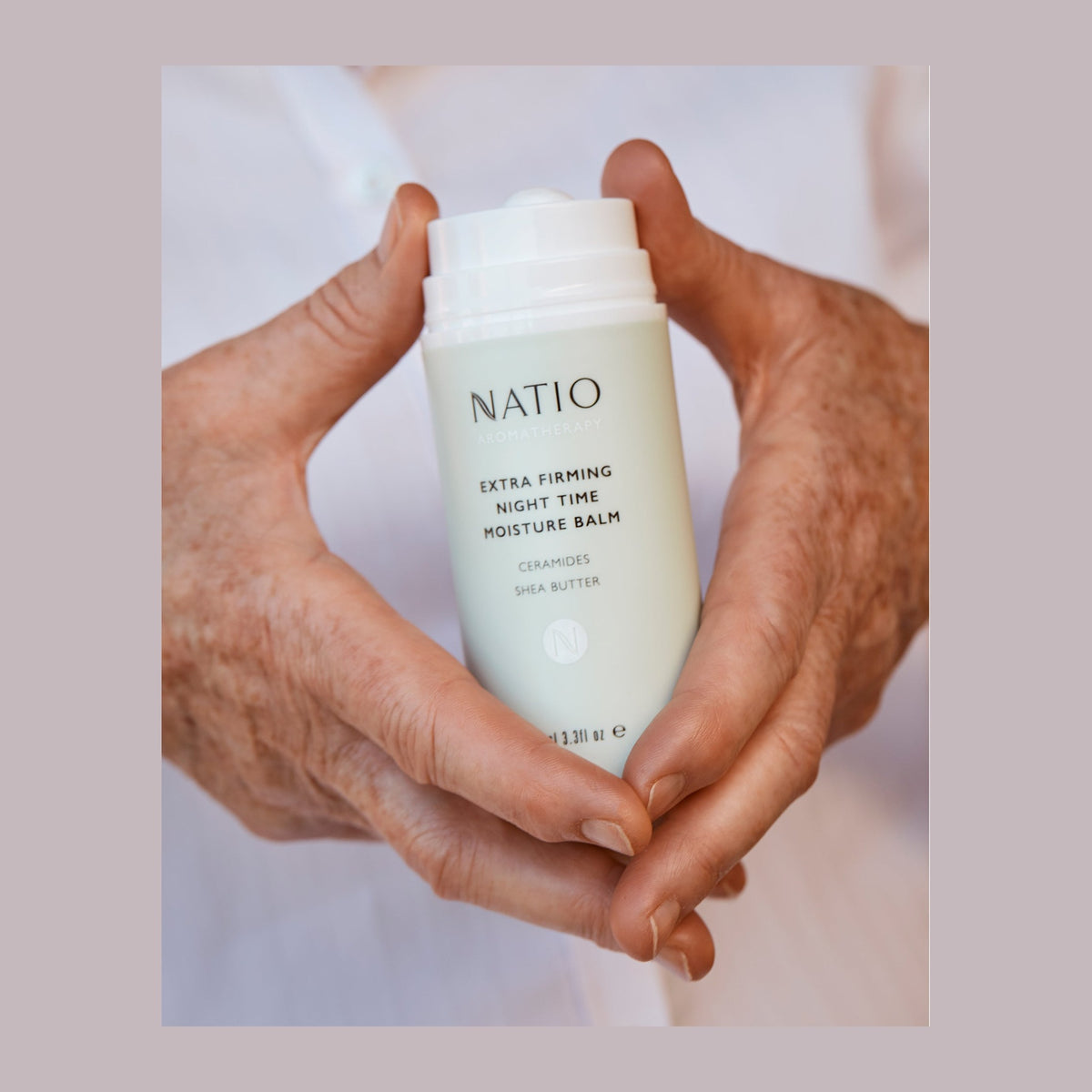 Natio Extra Firming Night Balm 100ml shown in use