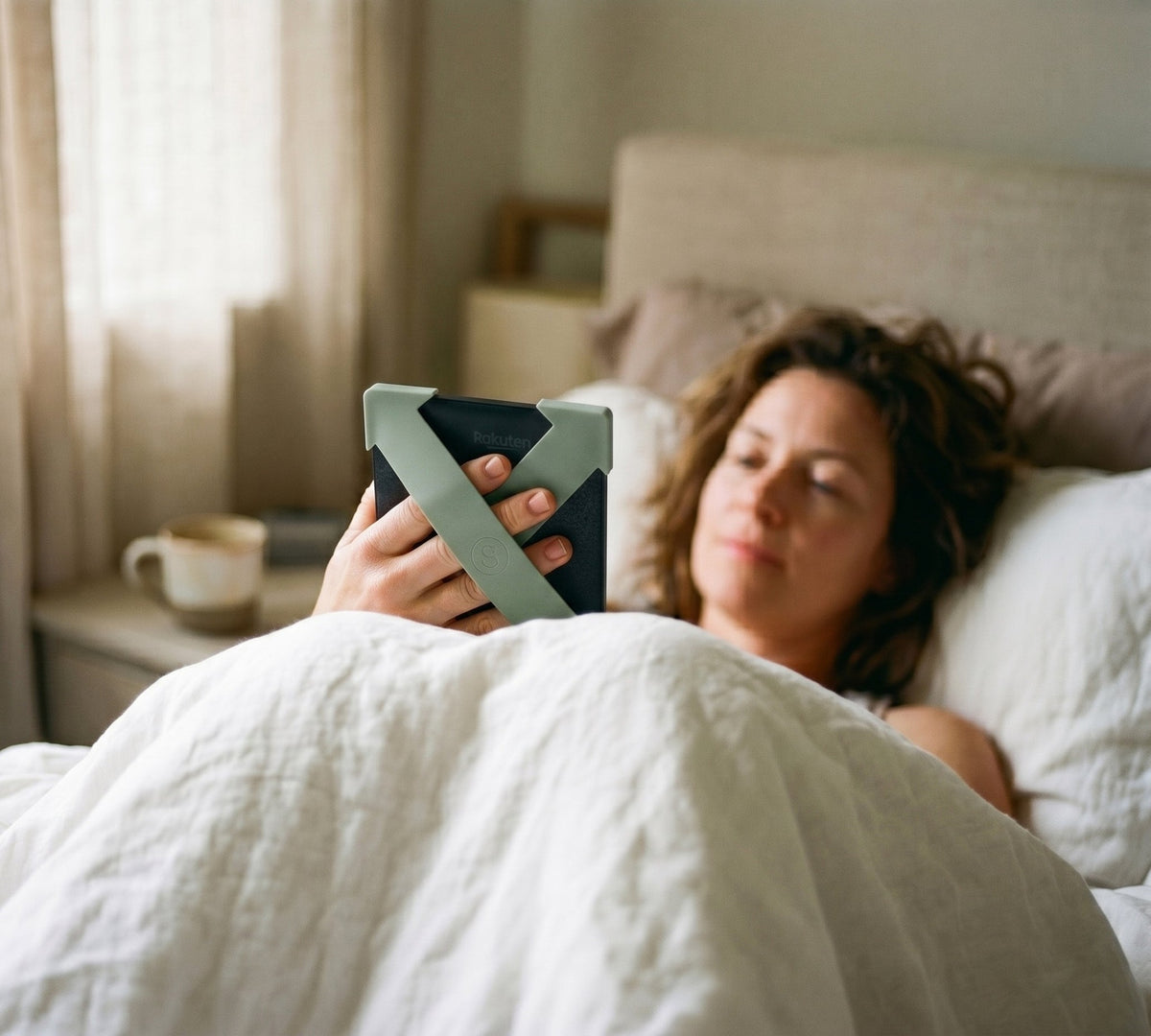 Strapsicle straps in Sage in use while reading