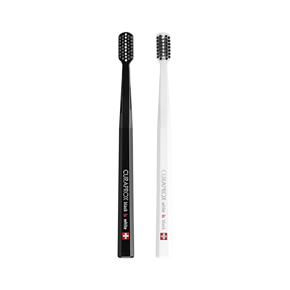 Curaprox Black is white toothbrush duo, one black brush and one white