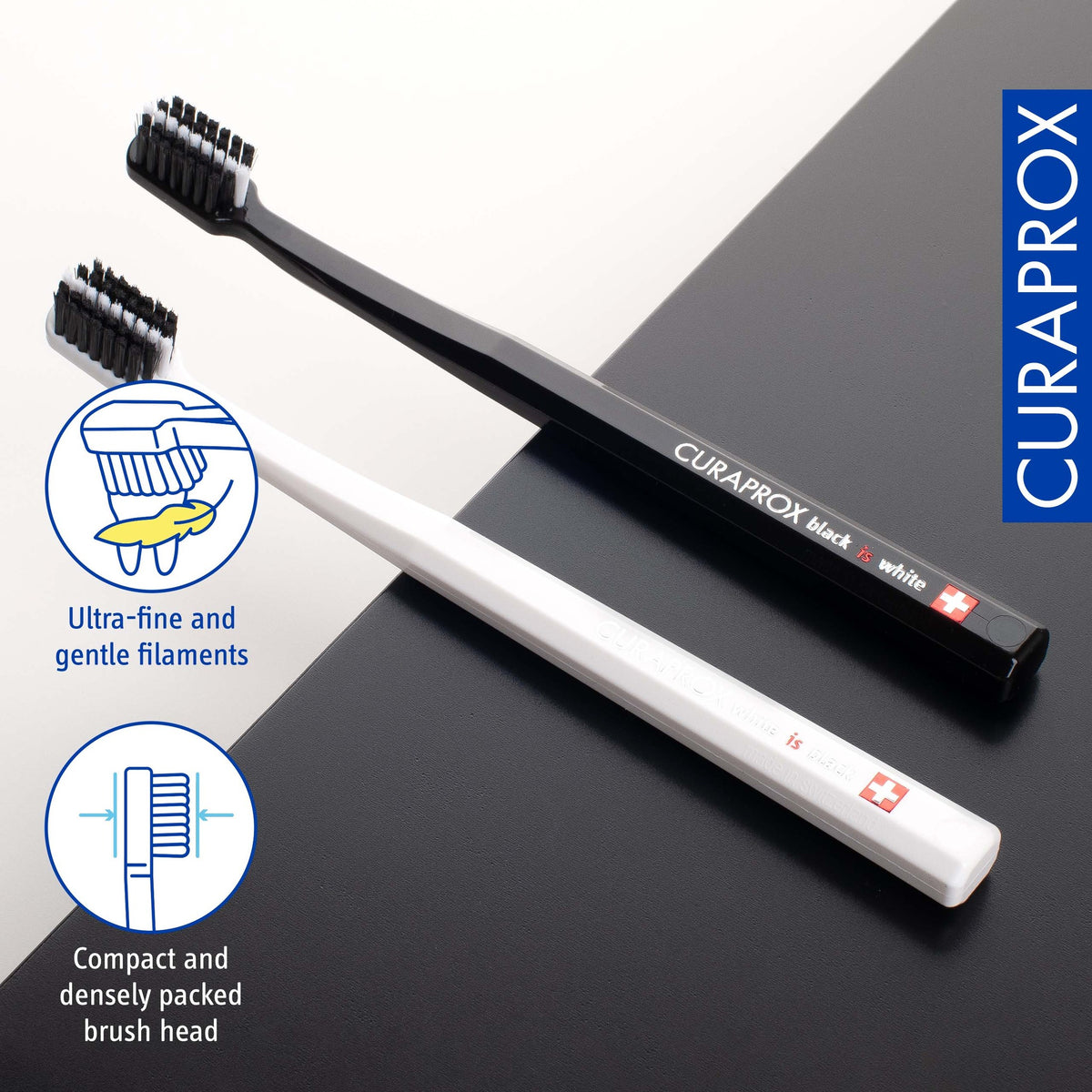 Curaprox Black is white black and white toothbrushes side by side