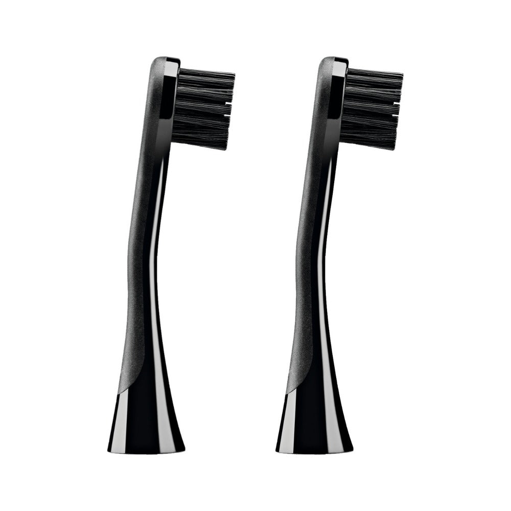 Two Curaprox Black is white carbon sonic brush heads