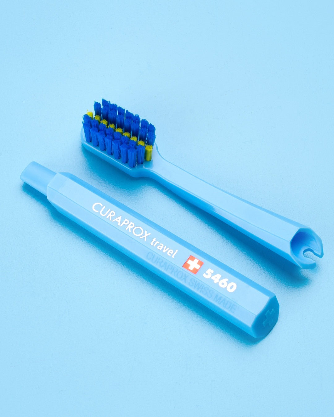 Two blue Curaprox ortho travel replacement brush heads