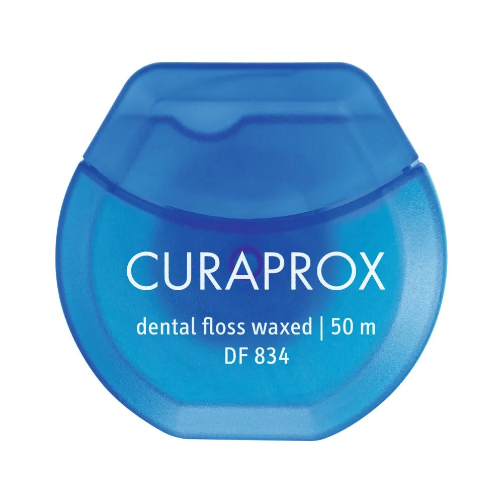 Curaprox DF 834 waxed mint dental floss 50m, front of the dispenser