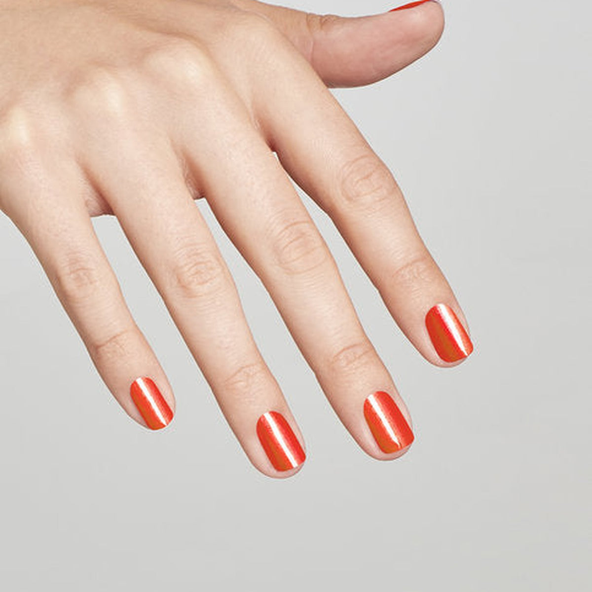 A manicure painted in OPI PCH Love Song