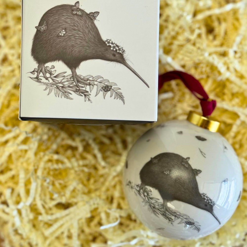 The Walking with Aroha kiwi bauble beside its printed gift box