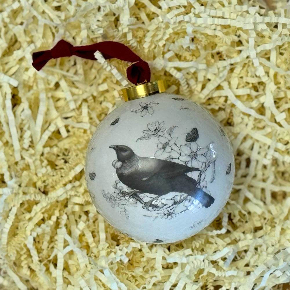 The reverse of the tui bauble, showing the native flora in the design