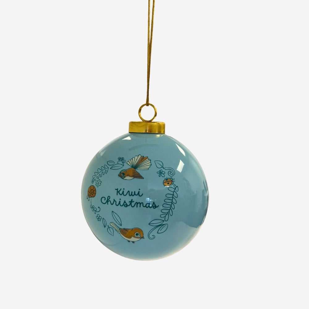 The reverse of the blue and gold Kuwi Christmas bauble