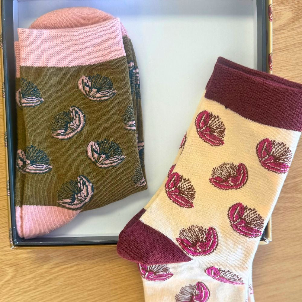 The pohutukawa socks in both colourways, folded