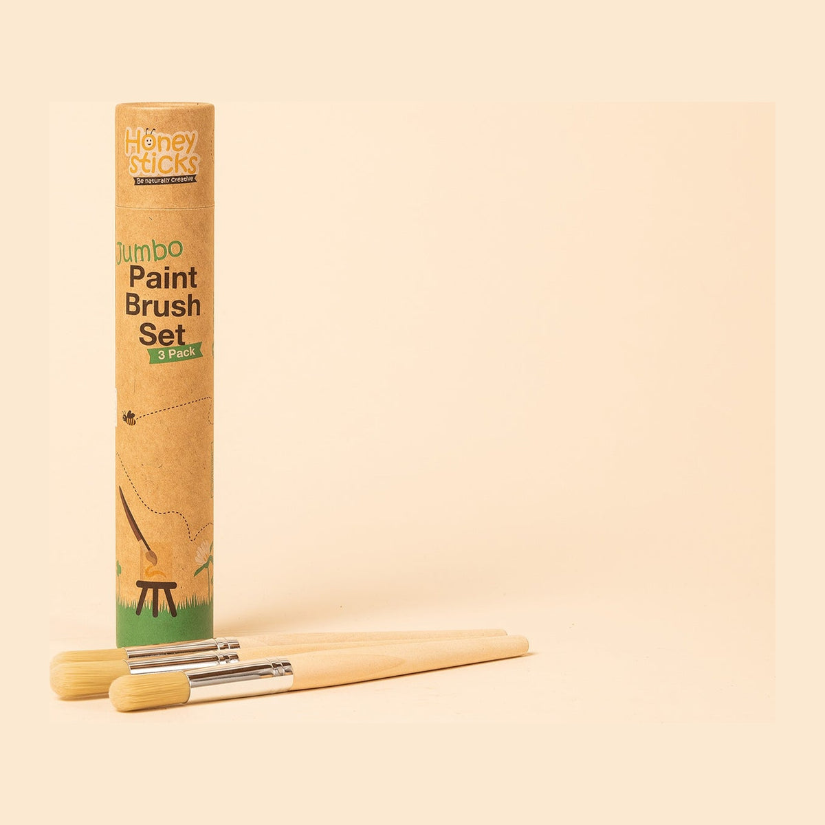 The Jumbo Paintbrush Set storage tube standing with brushes beside it