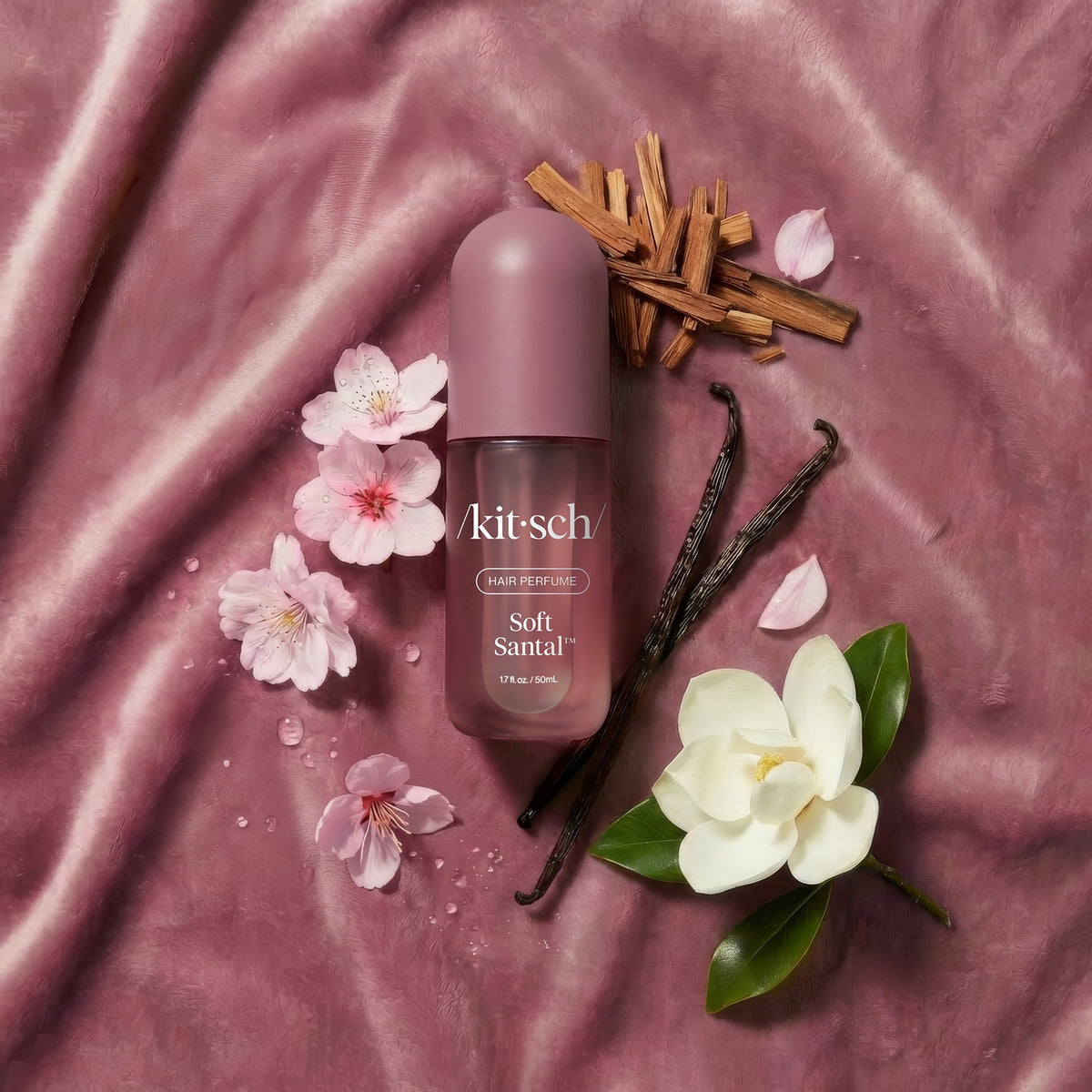 Soft Santal bottle on rose silk with cherry blossom, magnolia and vanilla pods