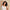 Woman spraying Kitsch Coastal Sorbet mist through her hair