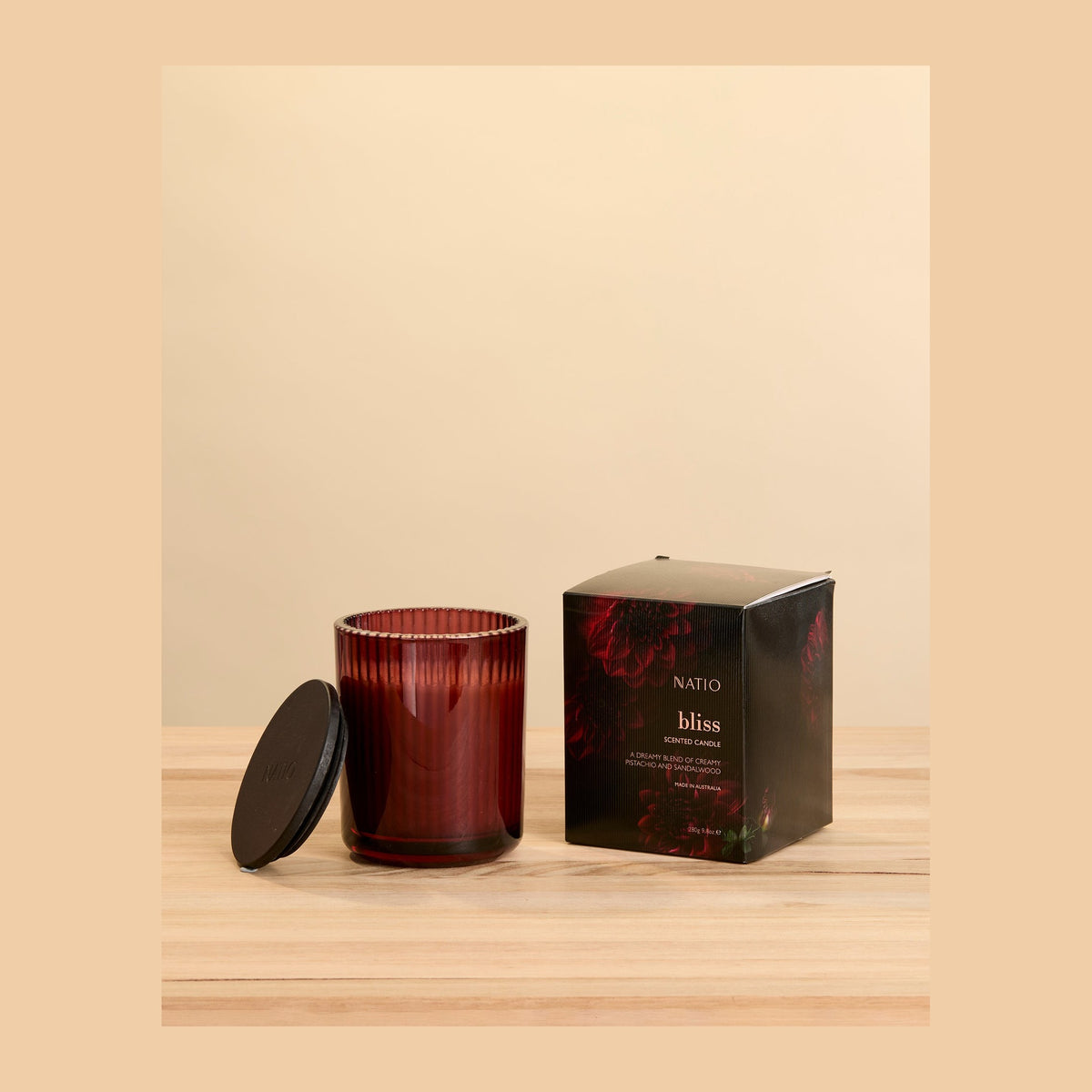 Natio Candle Bliss 280g styled in a set photograph
