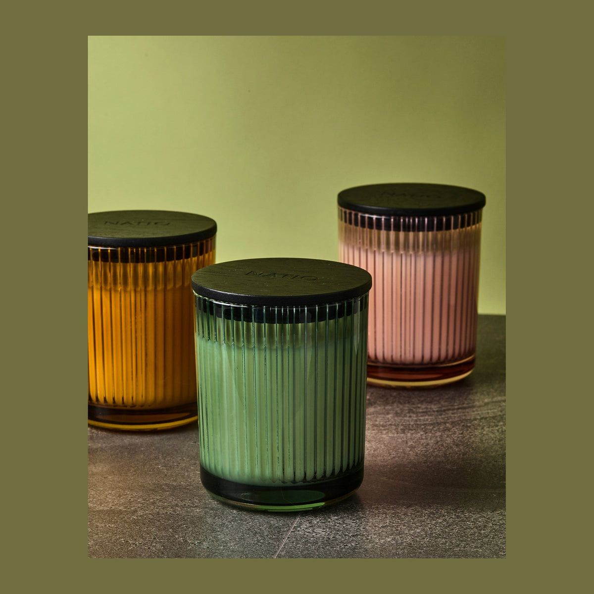 Natio Happy Scented Candle 280g styled in a set photograph