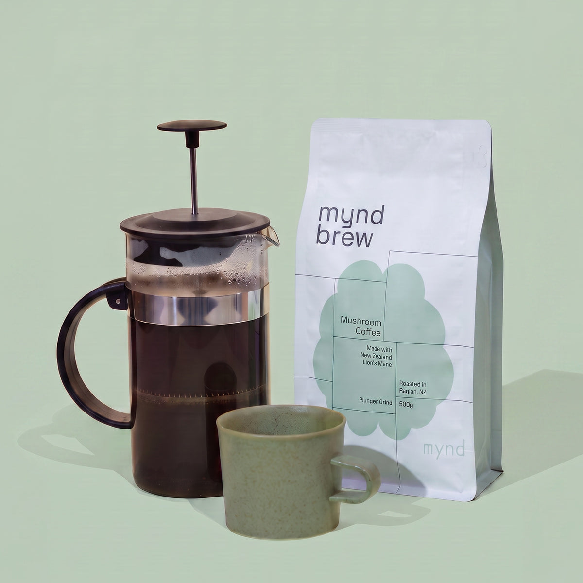 Mynd Brew 500g coffee bag beside a plunger and mug