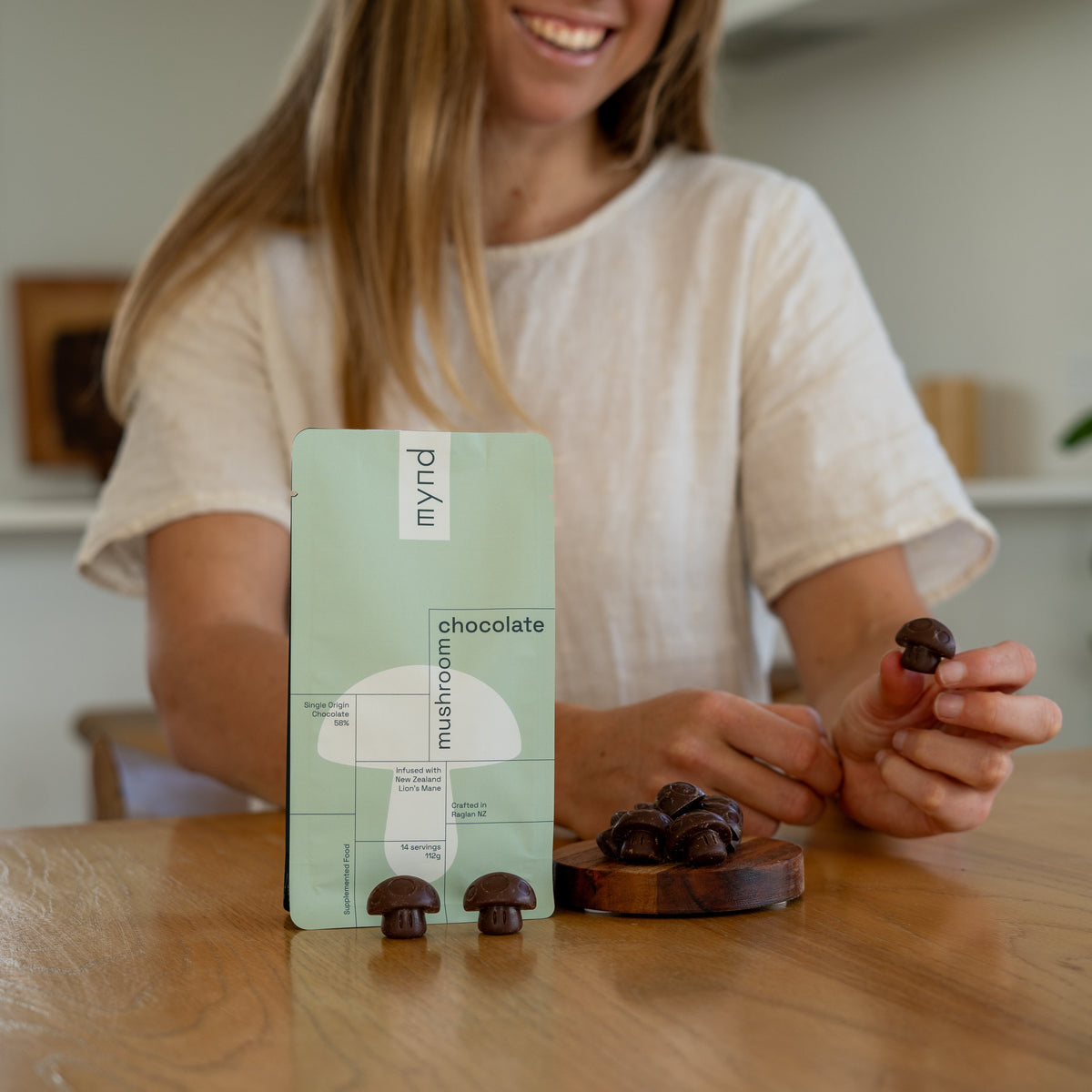 Mynd Mushroom Chocolate on a table being shared