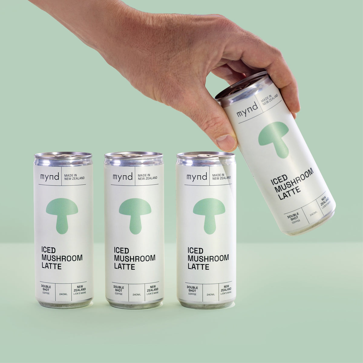 Several Mynd Iced Mushroom Latte cans together
