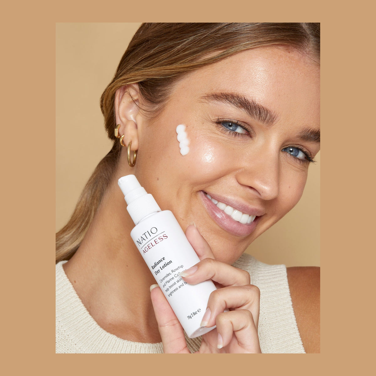 Natio Ageless Rad. Day Lotion 75g shown in use