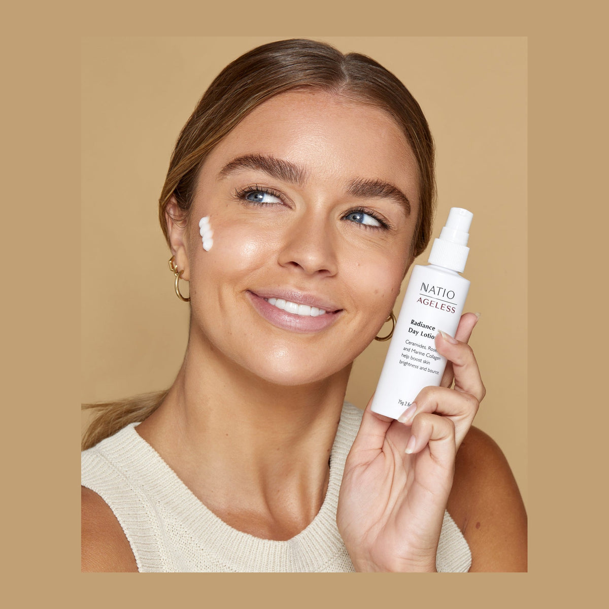 Natio Ageless Rad. Day Lotion 75g shown in use