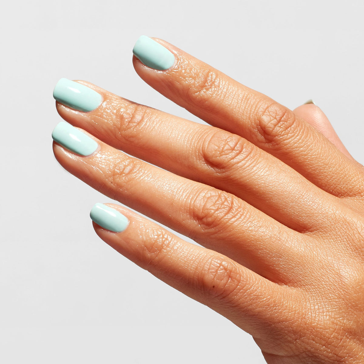 A manicure painted in OPI Nature Strong Vegan* Top Coat