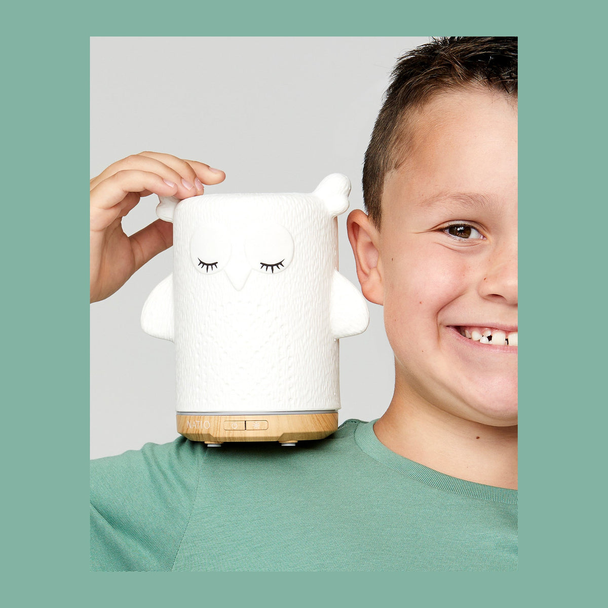 Natio Olive the Owl Ultrasonic Diff. shown in use