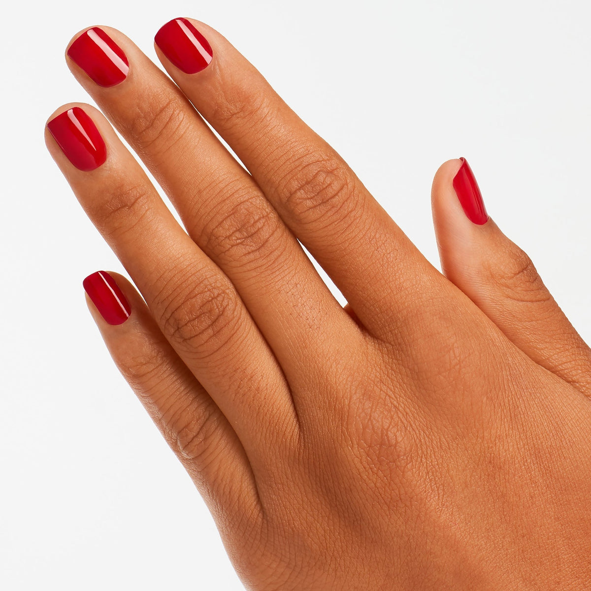 A manicure painted in OPI Red Hot Rio