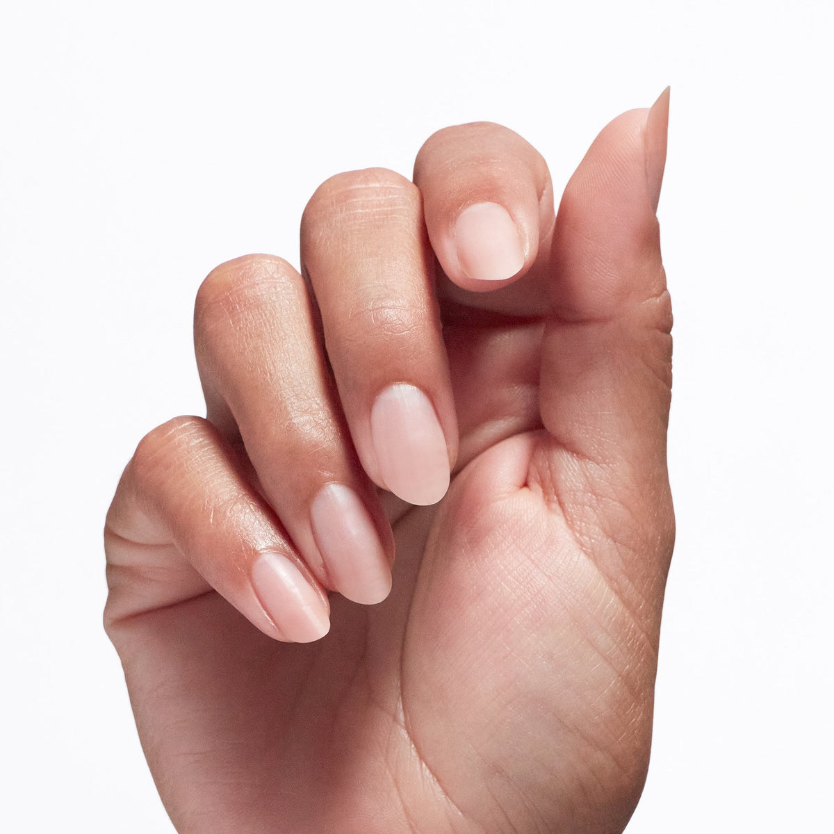 A manicure painted in OPI Repair Mode Bond Building Nail Serum