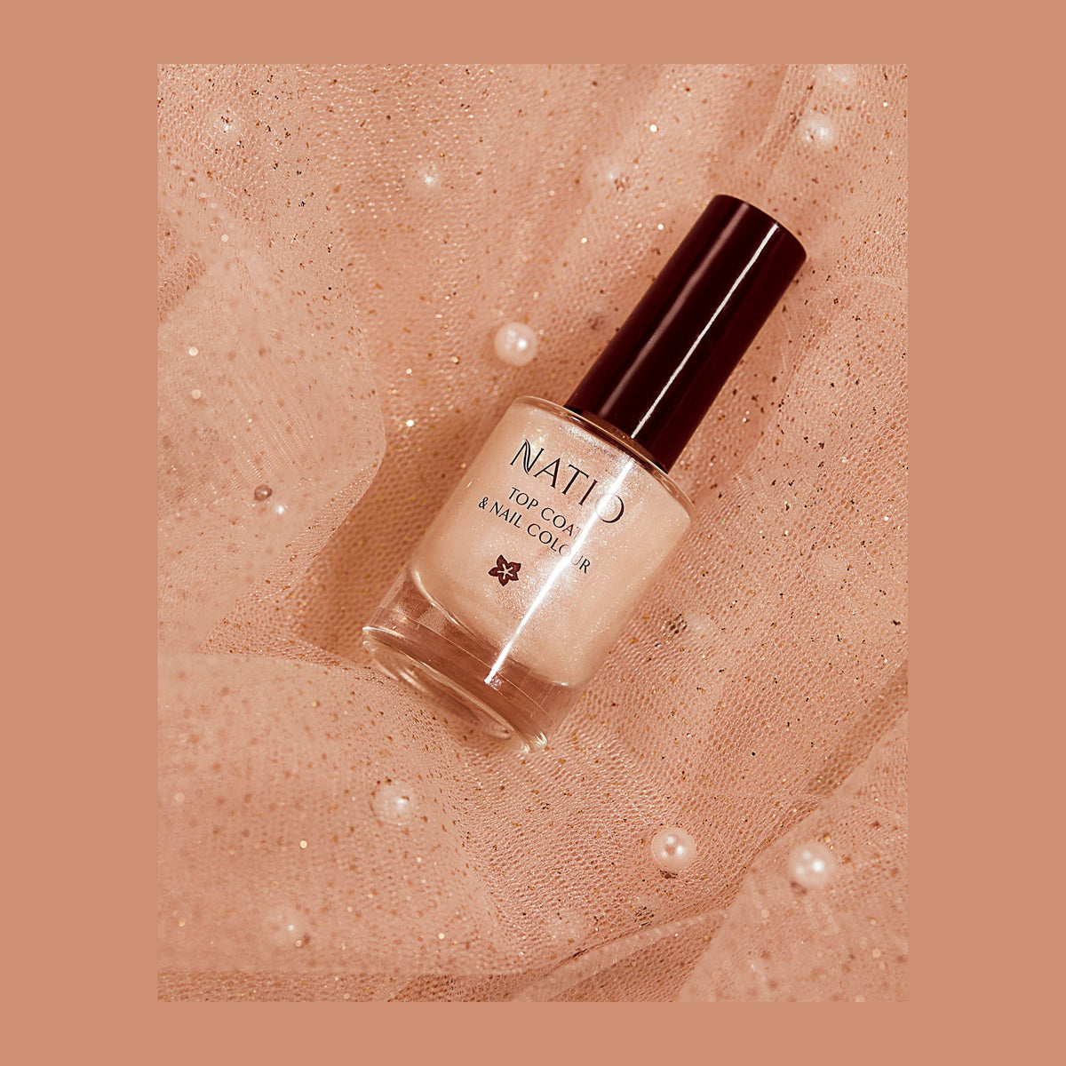Natio Top Coat & N/C Dazzle 10ml styled in a set photograph