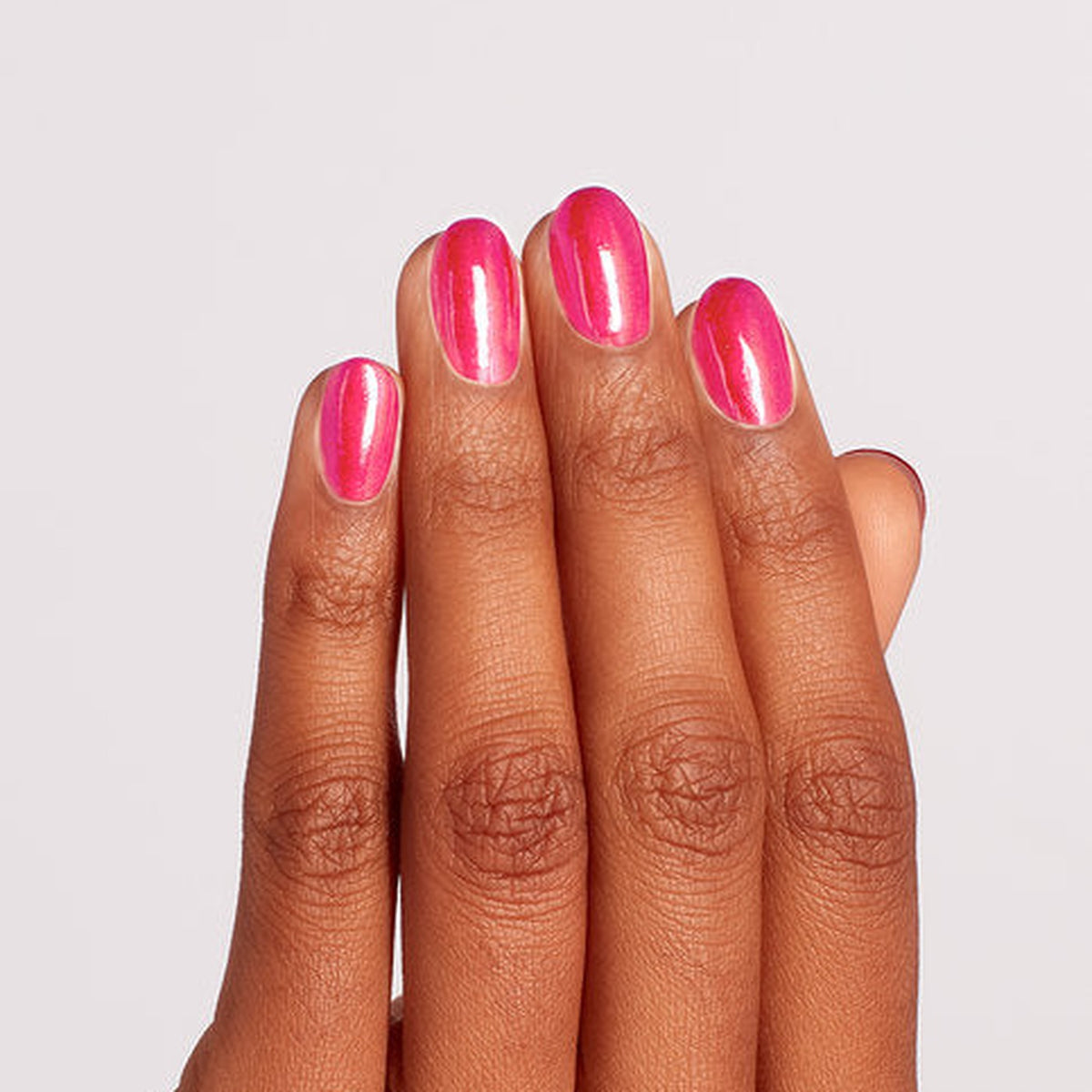 A manicure painted in OPI Strawberry Waves Forever