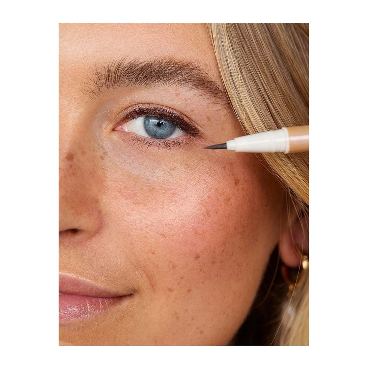 Natio Bronze Goddess Liquid Eye Liner 0.5ml shown in use
