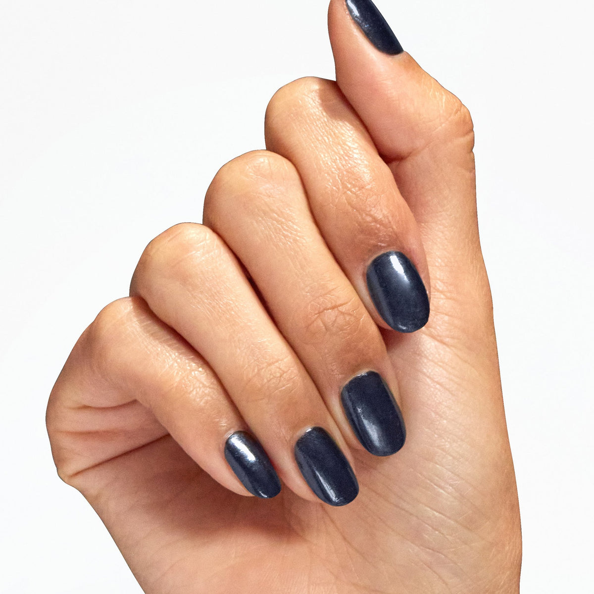 A manicure painted in OPI Midnight Mantra