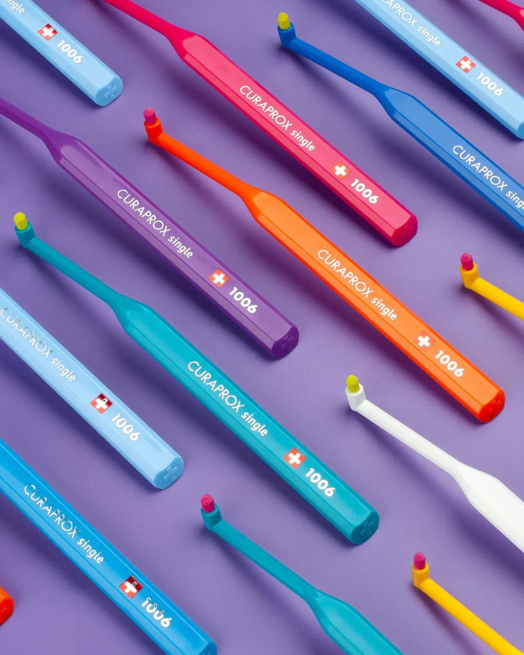 Curaprox CS 1006 single tuft toothbrushes in assorted colours