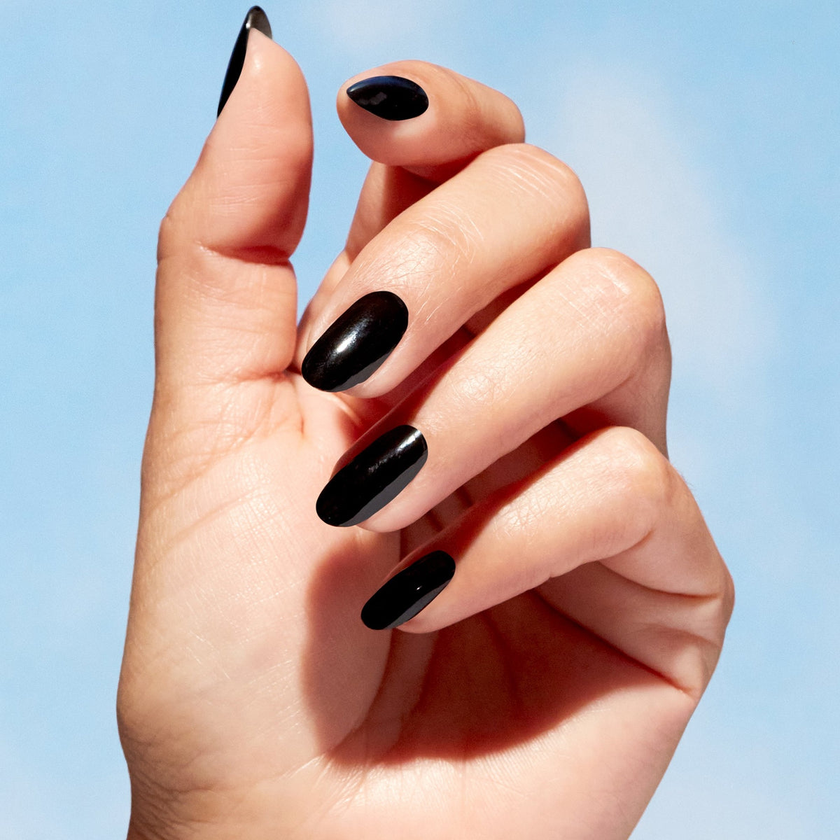 A manicure painted in OPI Onyx Skies
