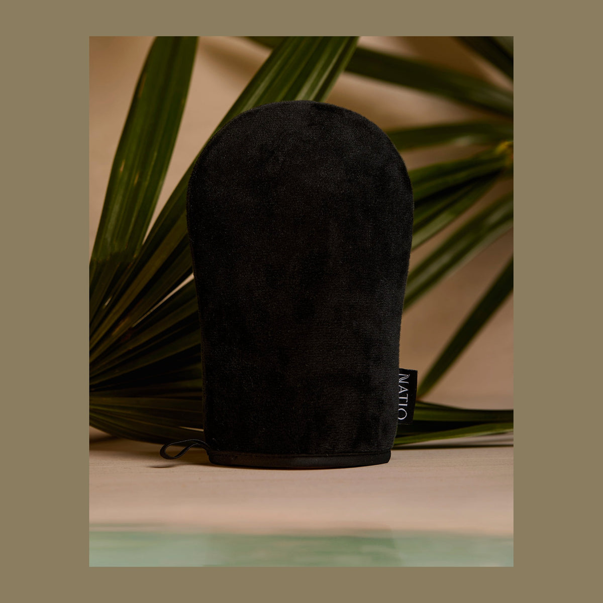 Natio Self Tan Application Mitt styled in a set photograph