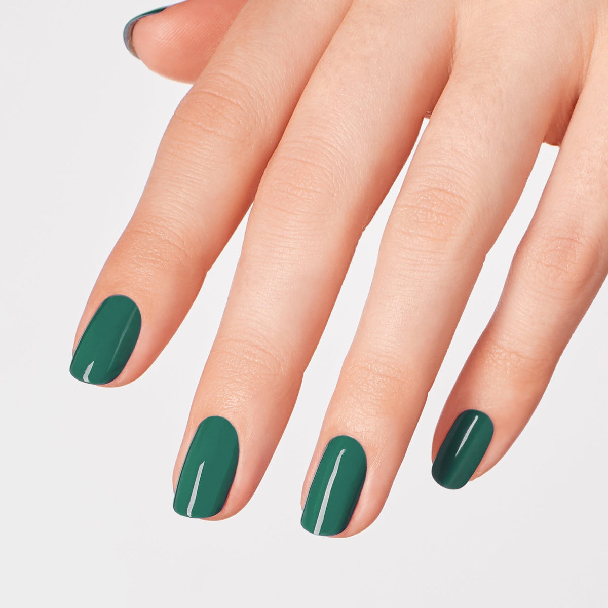 A manicure painted in OPI Rated Pea-G