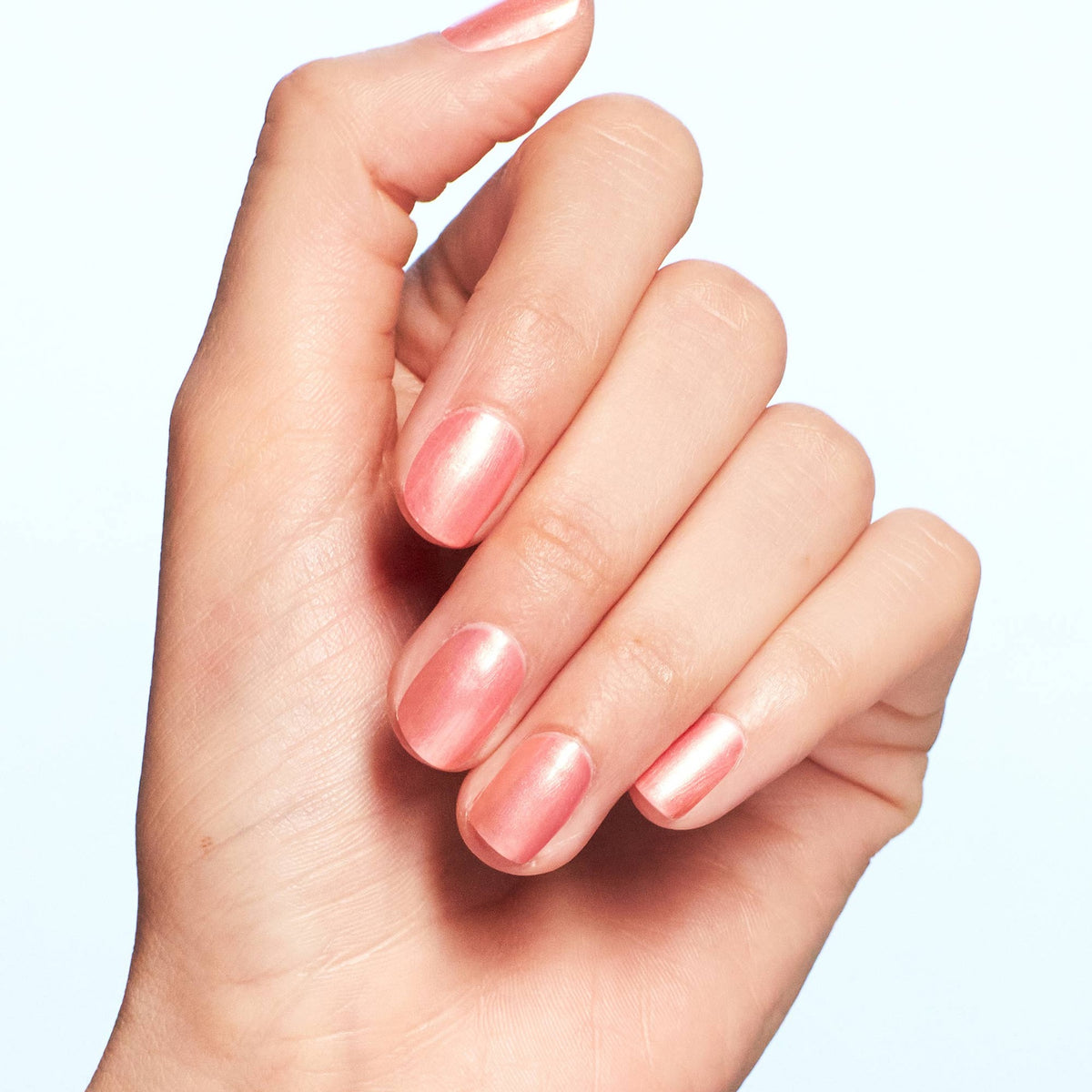 A manicure painted in OPI Data Peach