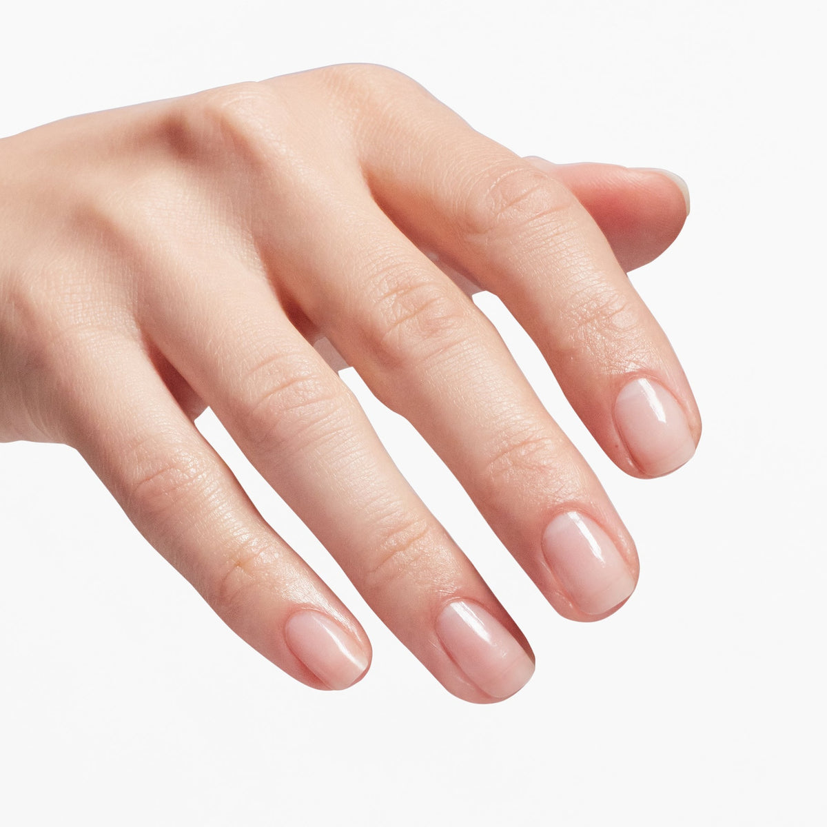 A manicure painted in OPI Start to Finish 3-in-1 Treatment