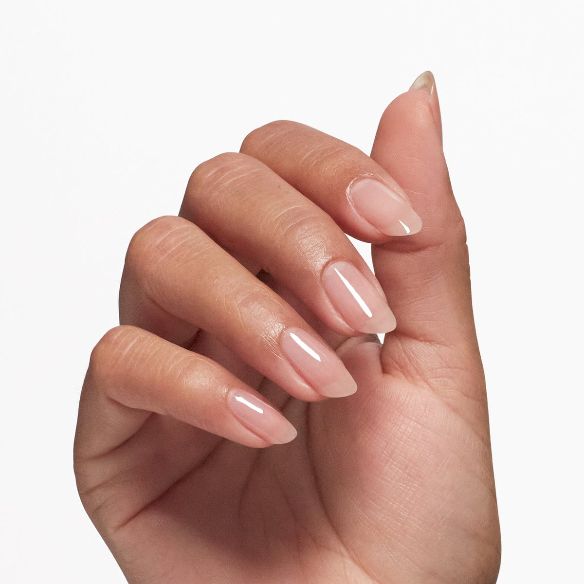 A manicure painted in OPI Nail Envy Pink To Envy