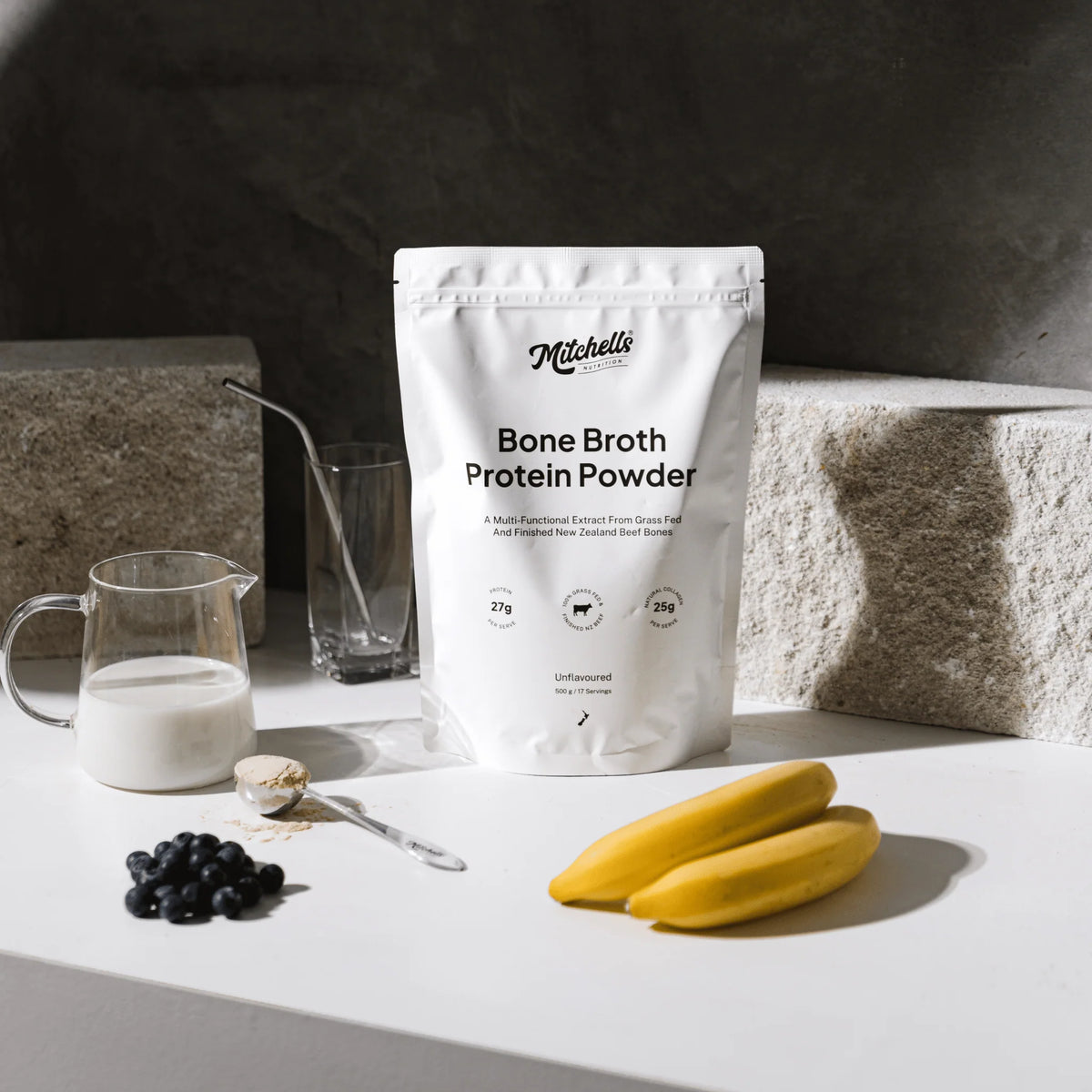 Image of Bone Broth Protein Powder Unflavoured 500g on bench with food