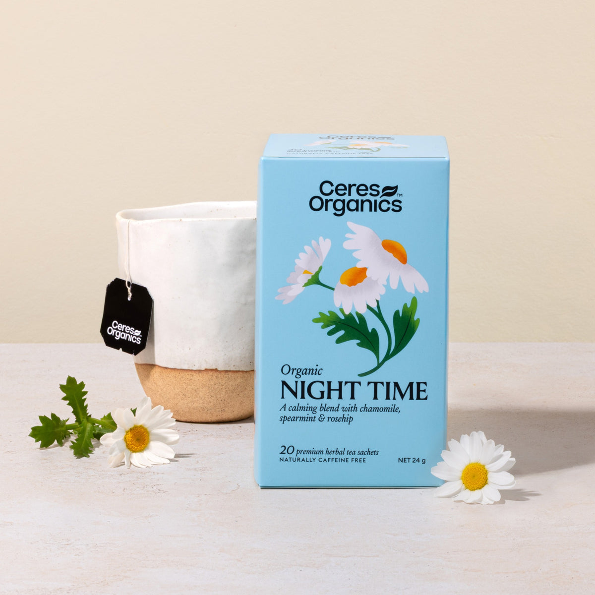 Ceres Organics Night Time Herbal Tea box beside a cup of tea