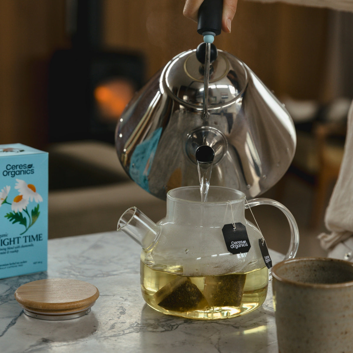 Night Time Herbal Tea brewing in a glass teapot