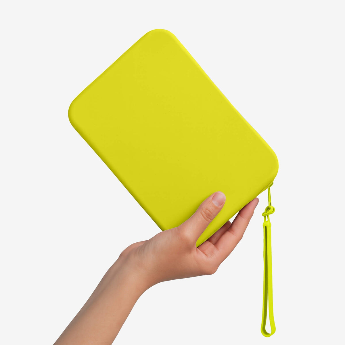 The Strapsicle Clutch in Neon Lemon in use, another view