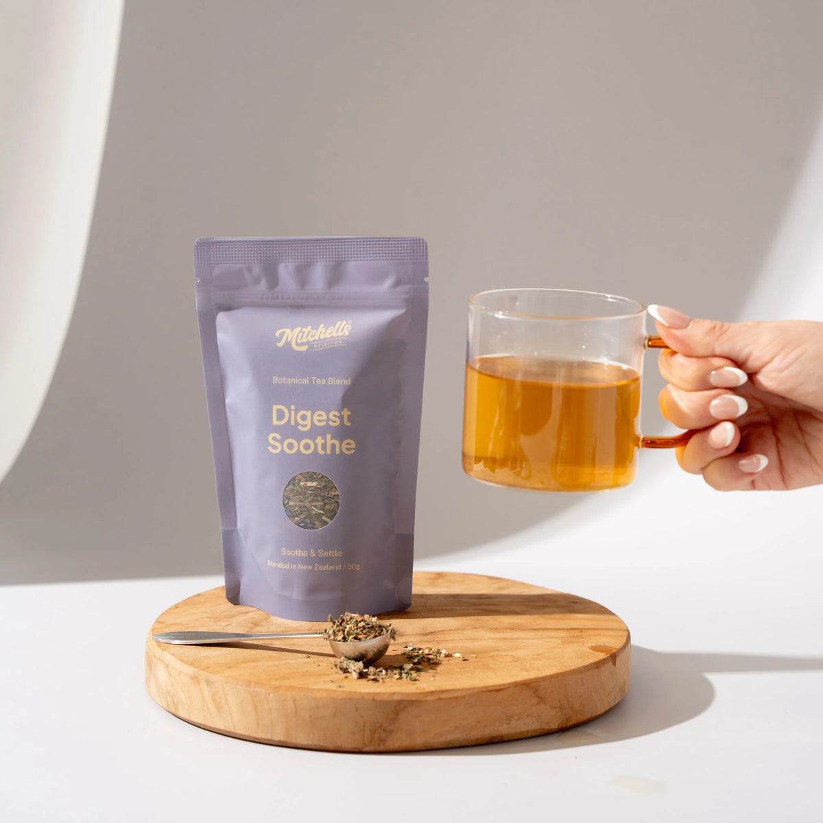 Image of Digest Soothe Botanical Tea Blend made into cup of tea