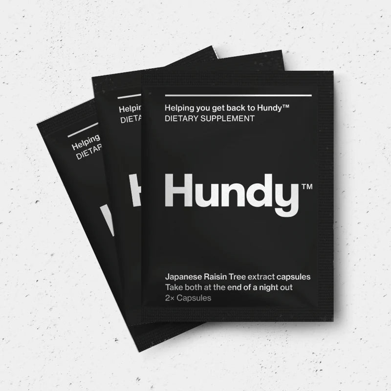 Image of 3 sachets of hundy showing they are black coloured with 2 capsules per sachet