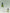 Two green bottles with black droppers and 'HINU' branding on a light gray background.