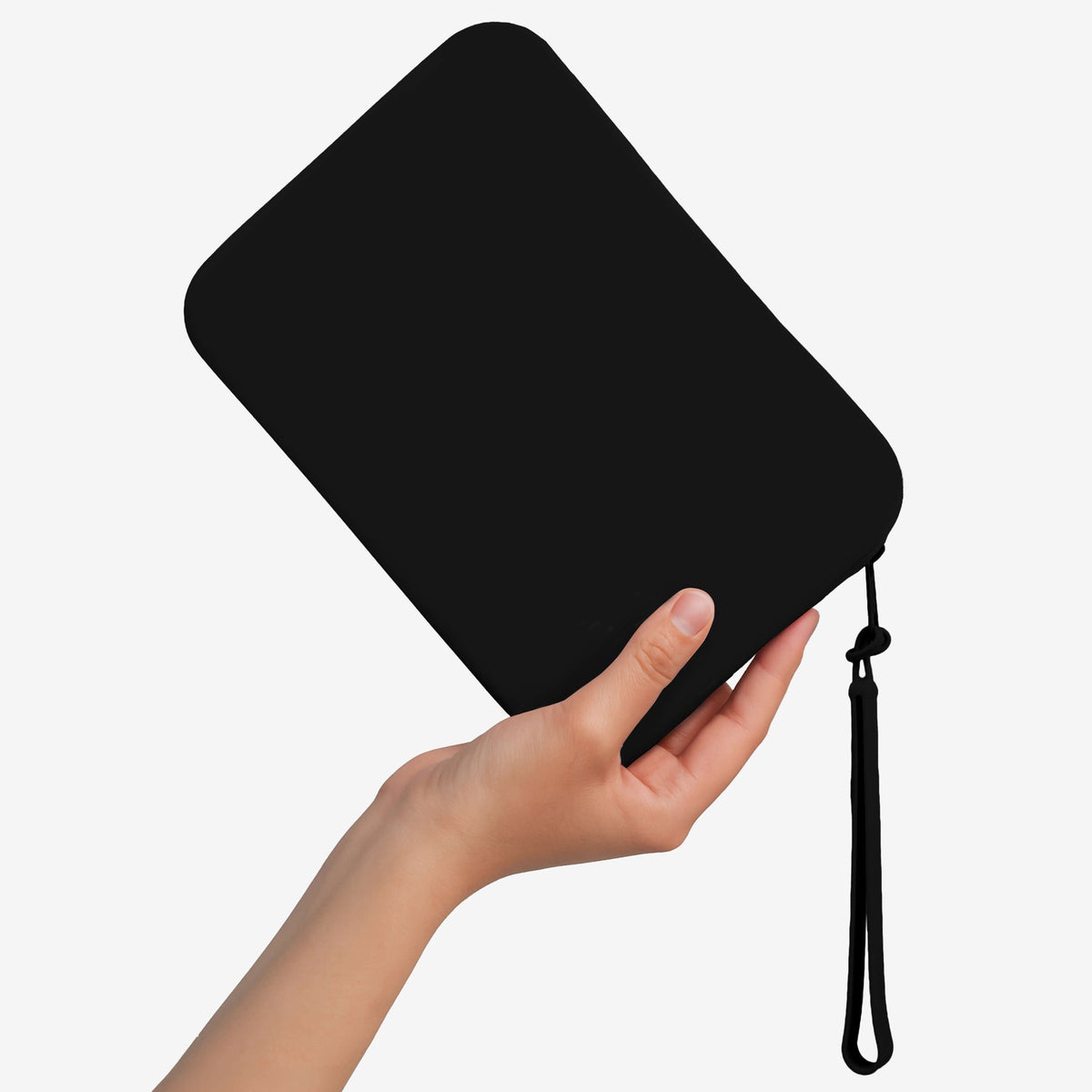 The Strapsicle Clutch in Black, a second view in the hand