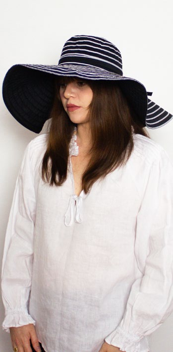 Female model wearing Ladies Hat Duet in black