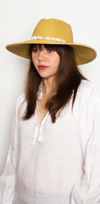 female model wearing haze hat in natural