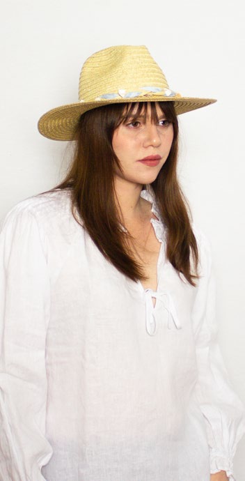 female model in white shirt wearing the Ladies Hat Soren Multi
